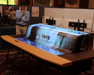LG 77'' flexible and transparent OLED smart desk